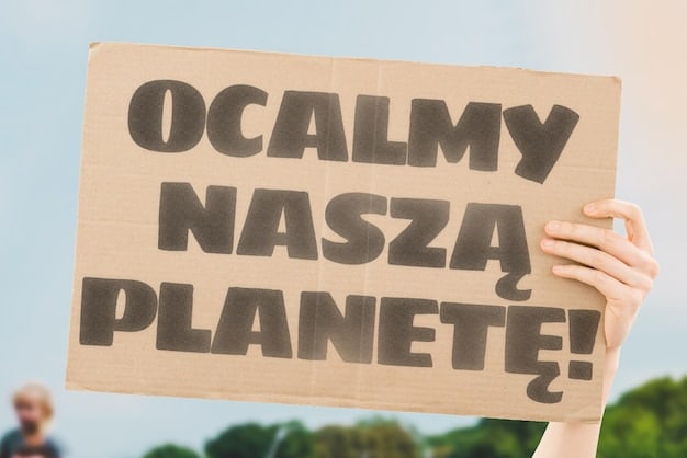 A protest sign at a climate rally reads 