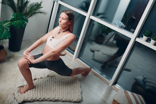 A person performing the knee-to-chest stretch on a yoga mat, with a focus on their relaxed posture and the gentle pull of their knee to their chest.
