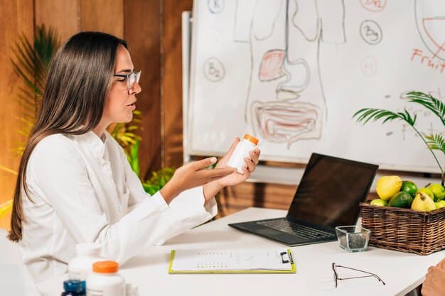 A nutritionist or doctor discussing a personalized vitamin D plan with a patient, with charts or a supplement bottle visible in the background.