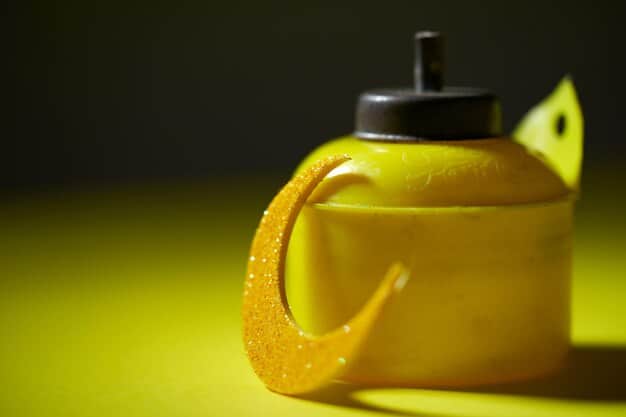 A close-up of a sports drink bottle mid-workout, with drops of condensation, emphasizing hydration and replenishment during exercise.