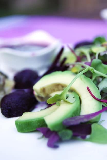 A bright, appealing close-up of a colorful, well-balanced meal, showing a mix of fresh vegetables, a lean protein source like grilled salmon or chicken, and a portion of whole grains such as quinoa or brown rice. The focus is on freshness and natural ingredients, symbolizing nutritious eating.