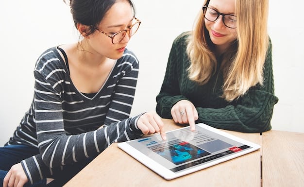 An educator interacting with a student while reviewing data insights on a tablet, illustrating the complementary role of AI and human teaching in personalized education.