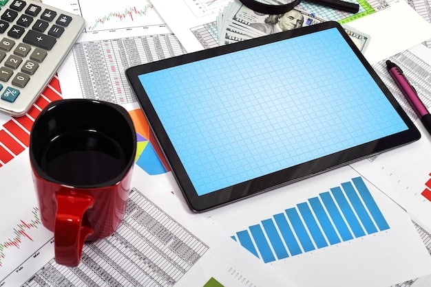 A detailed financial spreadsheet on a laptop screen, showing various investment categories and projected growth rates, with a calculator and coffee cup beside it.