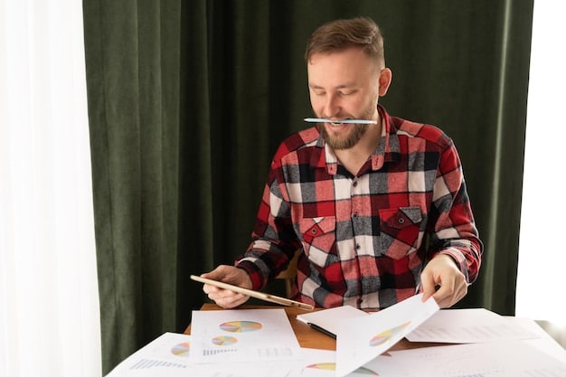 A person meticulously categorizing financial documents and making notes, symbolizing careful financial planning and budgeting for future educational endeavors.