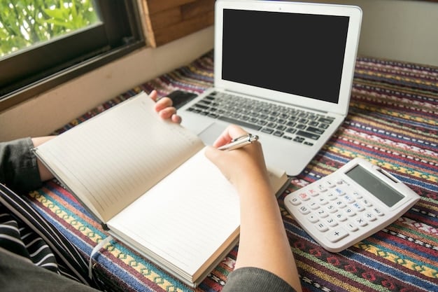 A student sitting at a desk with a calculator, notebook, and a laptop, appearing to be budgeting or planning finances. The background shows a diploma or academic books, emphasizing education.