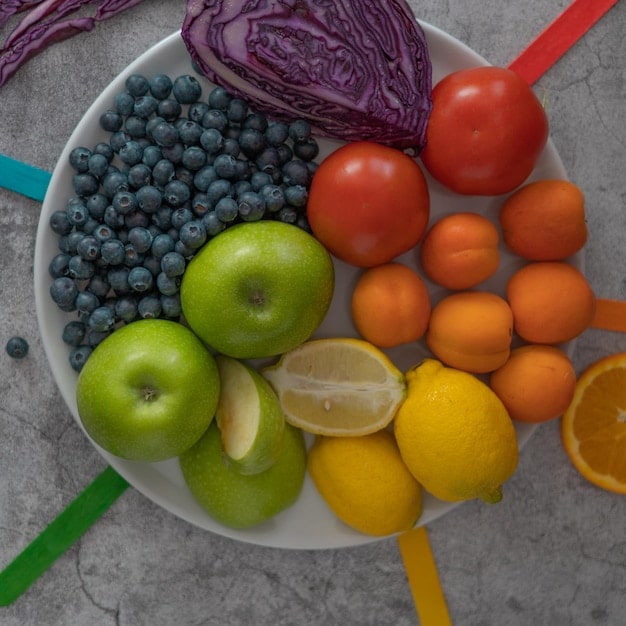 A close-up of a diverse array of colorful vegetables and fruits, emphasizing whole foods that support gut health.