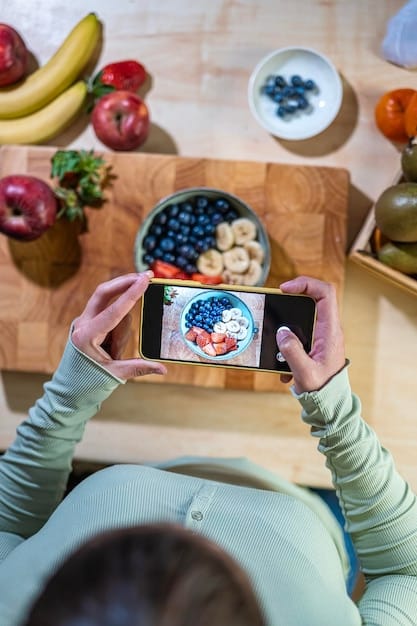A person holding a smartphone, looking at a personalized nutrition app showing data visualizations of gut microbiome diversity and mental health correlations, set against a background of healthy food.