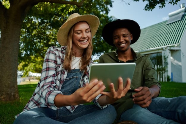 A diverse group of people in a rural community using laptops and tablets connected to the internet, showing improved access.