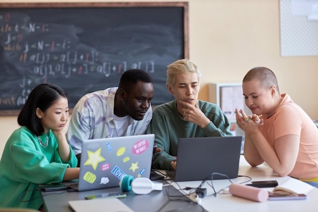 A teacher facilitating a small group discussion with high school students, using a laptop and interactive tools to explain complex financial concepts in an engaging way.
