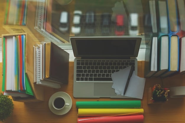 A detailed shot of open textbooks on a desk with a laptop and coffee, showcasing a focused study environment that integrates both digital and physical learning resources.